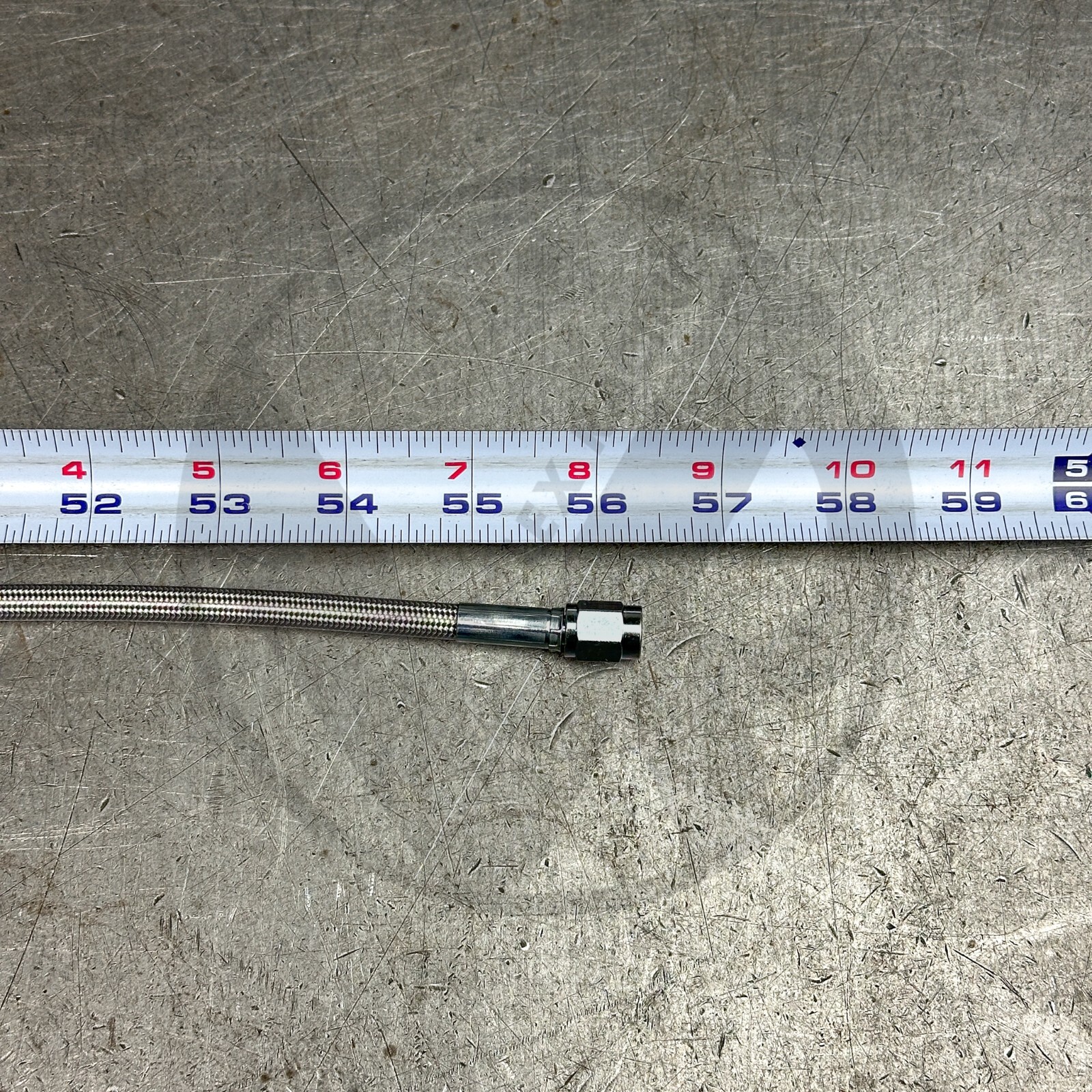 56″ Stainless Steel Braided Hydraulic Line (-3AN 90 Degree to -3AN Straight)