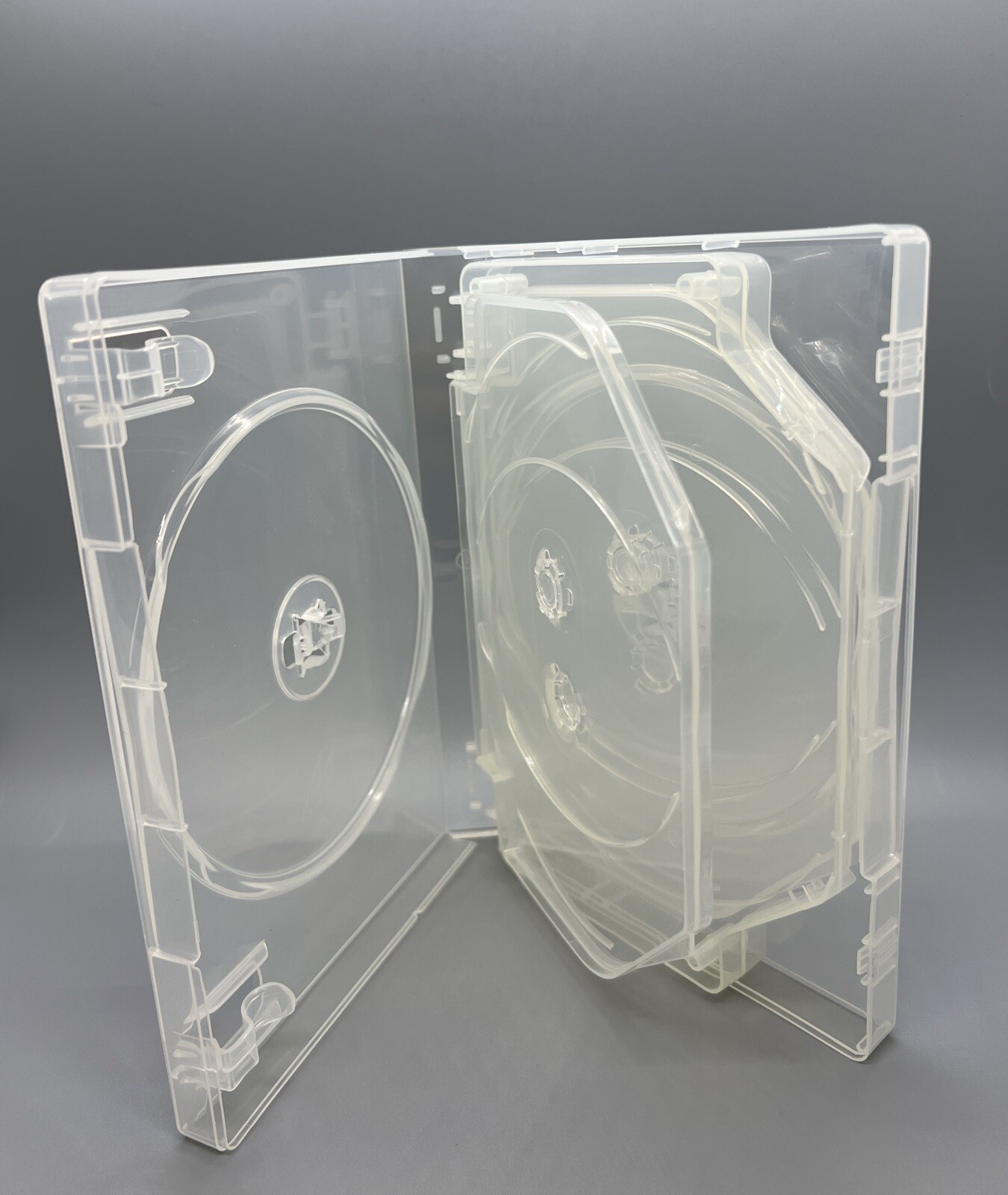 5 PCS TOP QUALITY NEW 27MM CLEAR 7-DVD CASE W/SWING TRAYS, M-LOCK HUB, FD-1201